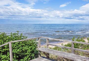 Фото номера Двухуровневые апартаменты Виллы Seaside Villa г. Каркле 76