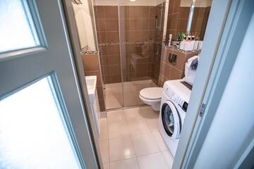 Фото номера Вилла с 2 спальнями Виллы KARKLE VILLA BOUTIQUE г. Каркле 54
