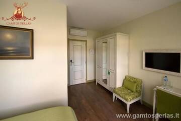Фото номера Небольшой двухместный номер с 1 кроватью Отель Gamtos Perlas г. Каркле 3