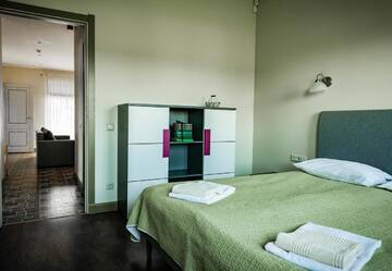 Фото номера Апартаменты с 2 спальнями Отель Gamtos Perlas г. Каркле 11