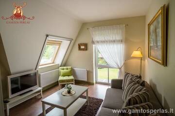 Фото номера Люкс с 1 спальней Отель Gamtos Perlas г. Каркле 2