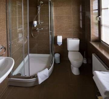 Фото номера Улучшенный двухместный номер с 1 кроватью Отель Gamtos Perlas г. Каркле 3